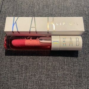 KAB cosmetics lip oil- rum punch, unused, new